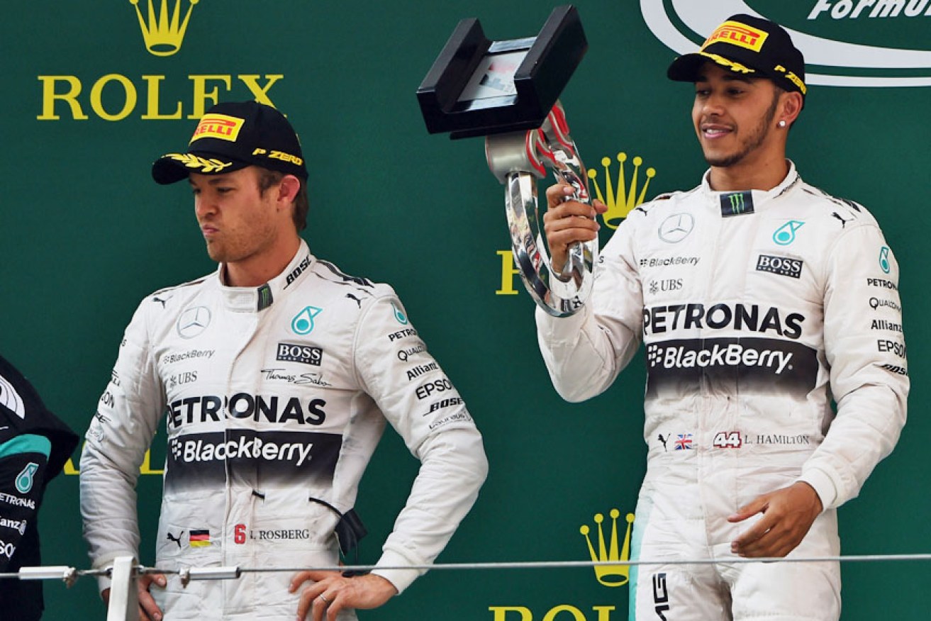 Hamilton, right, says he's not surprised by Rosberg's retirement. Photo: Getty