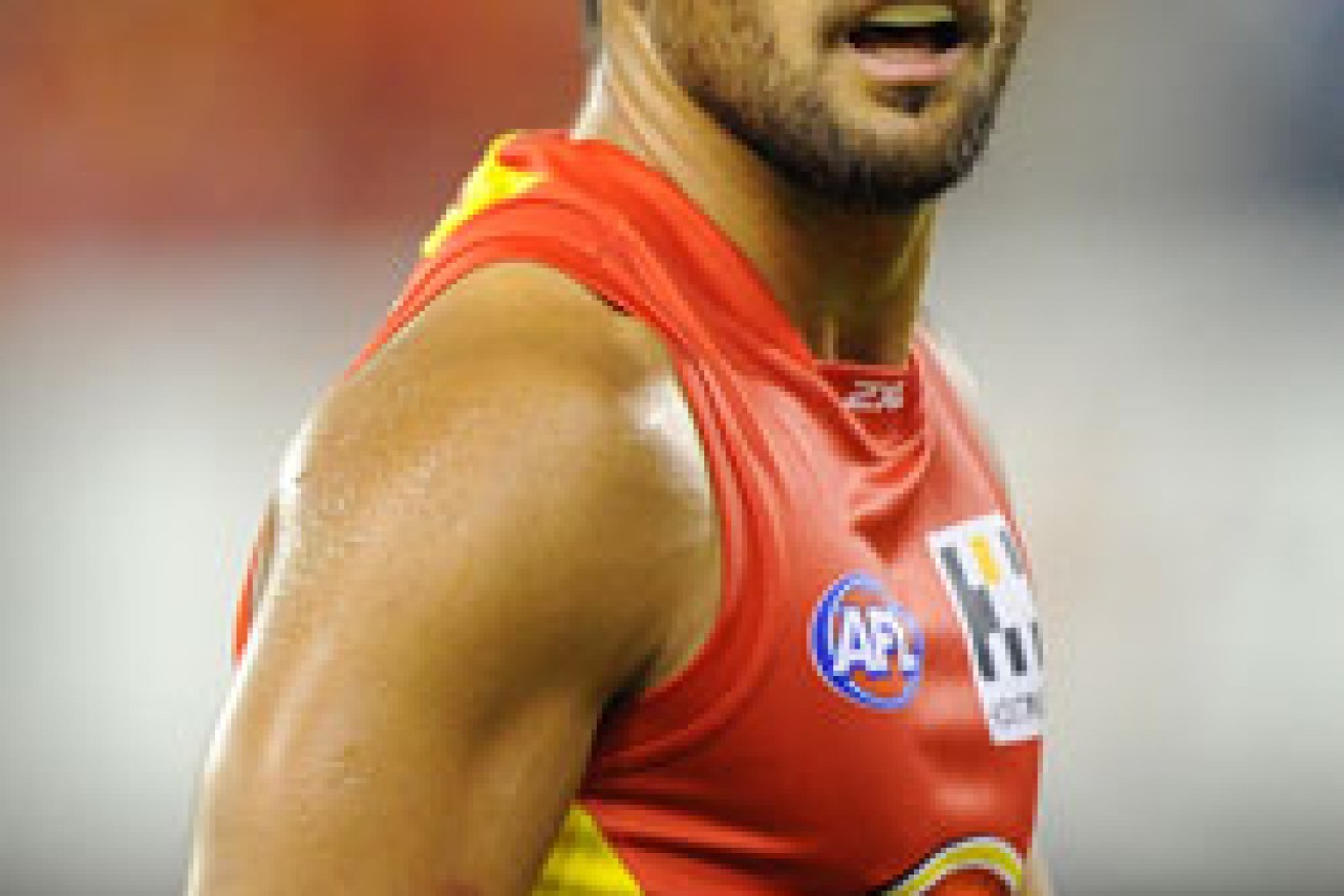 Hunt in his playing days with the Gold Coast. Photo: Getty