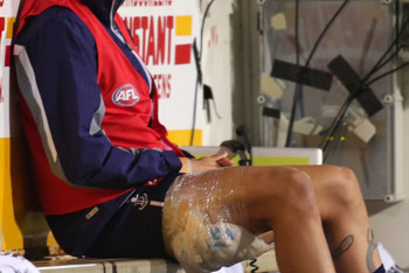 Michael Johnson's 200th AFL match did not go to plan. Photo: Getty
