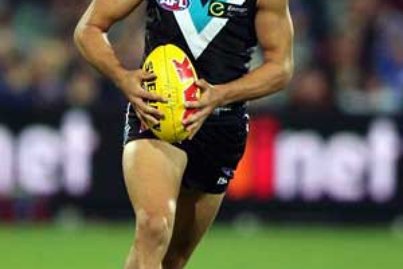 Port Adelaide's Chad Wingard received little support. Photo: Getty