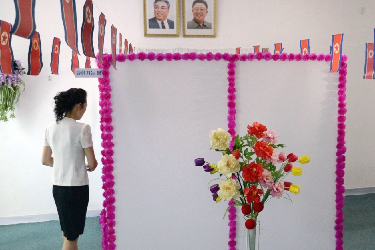 A woman in North Korea goes to vote in the "pre-approved" election. Photo: AAP