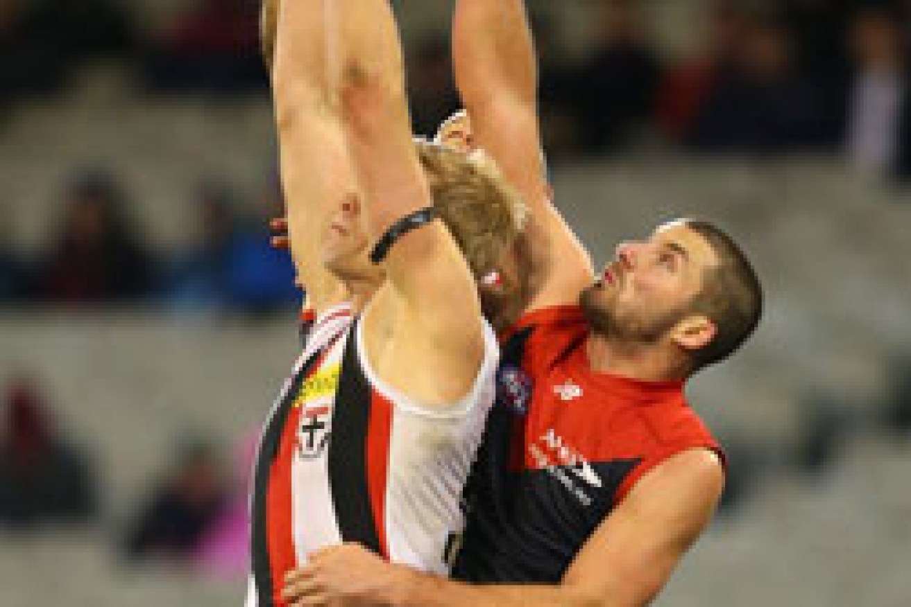 Riewoldt (L) flies for a mark. Photo: Getty