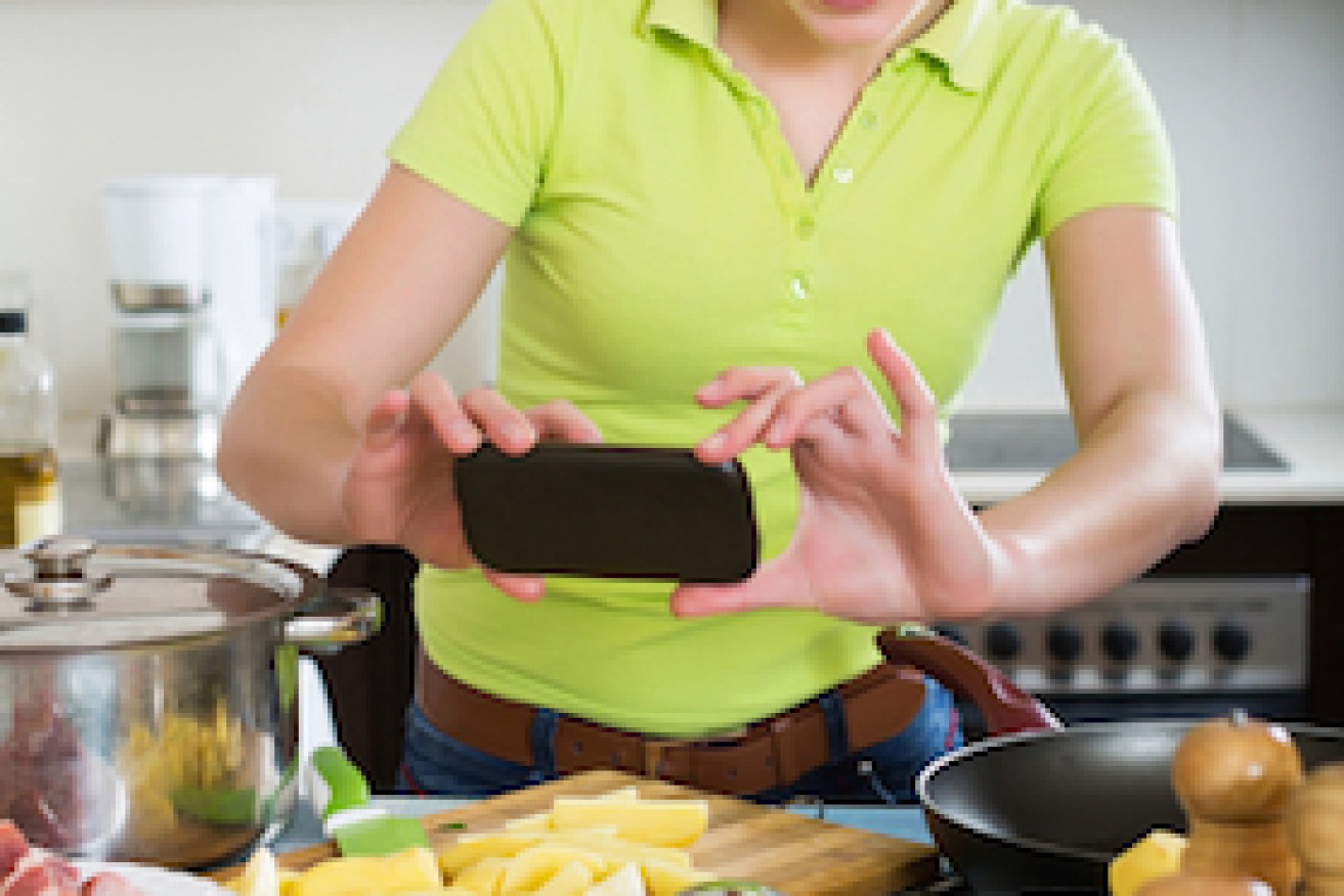 Snapping food photos while cooking is a bad idea for hygiene reasons. Photo: Shutterstock