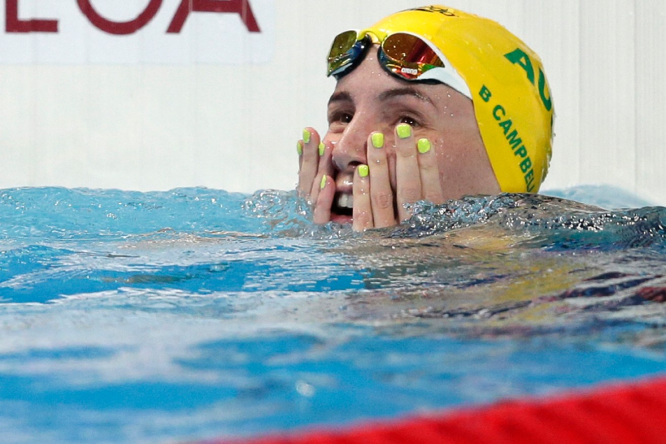 Australia's Bronte Campbell reacts after winning the women's 100m freestyle final at the Swimming World Championships in Kazan, Russia, Friday, Aug. 7, 2015. Cate Campbell won the bronze medal. (AP Photo/Michael Sohn))