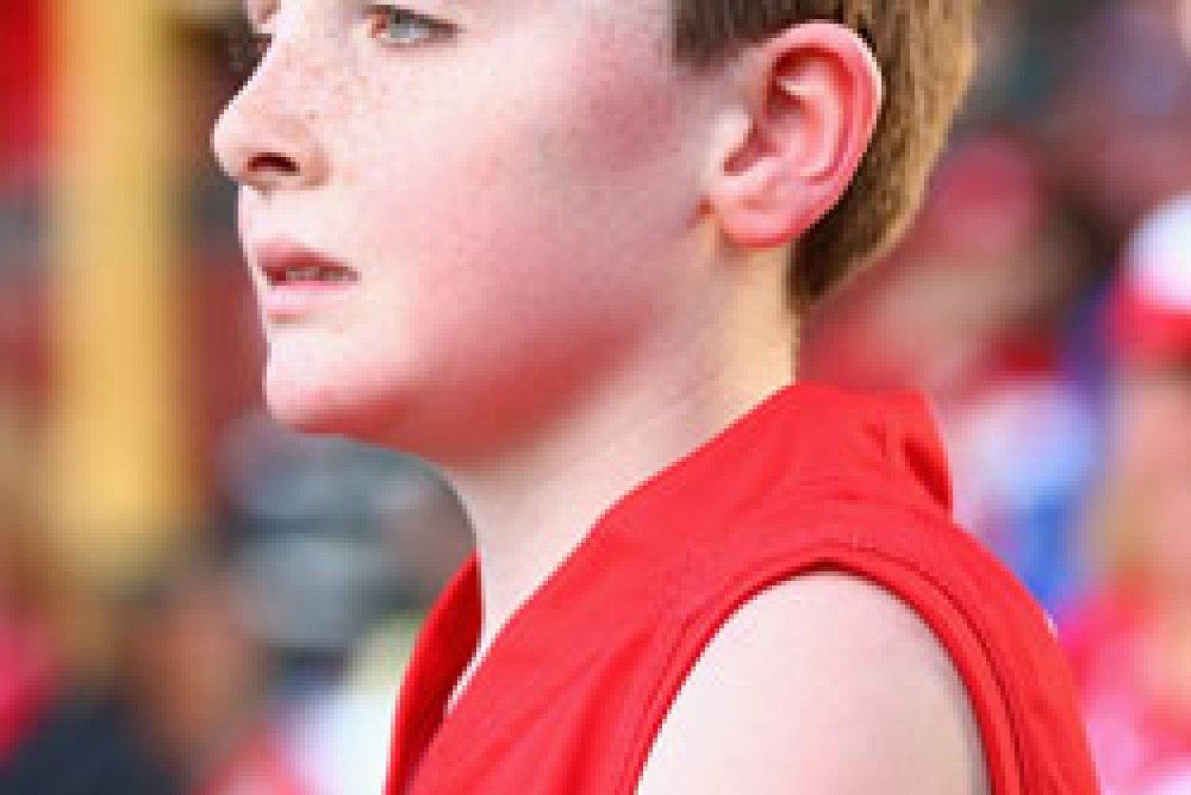 A young fan with Goodes' number written on his arm. Photo: Getty
