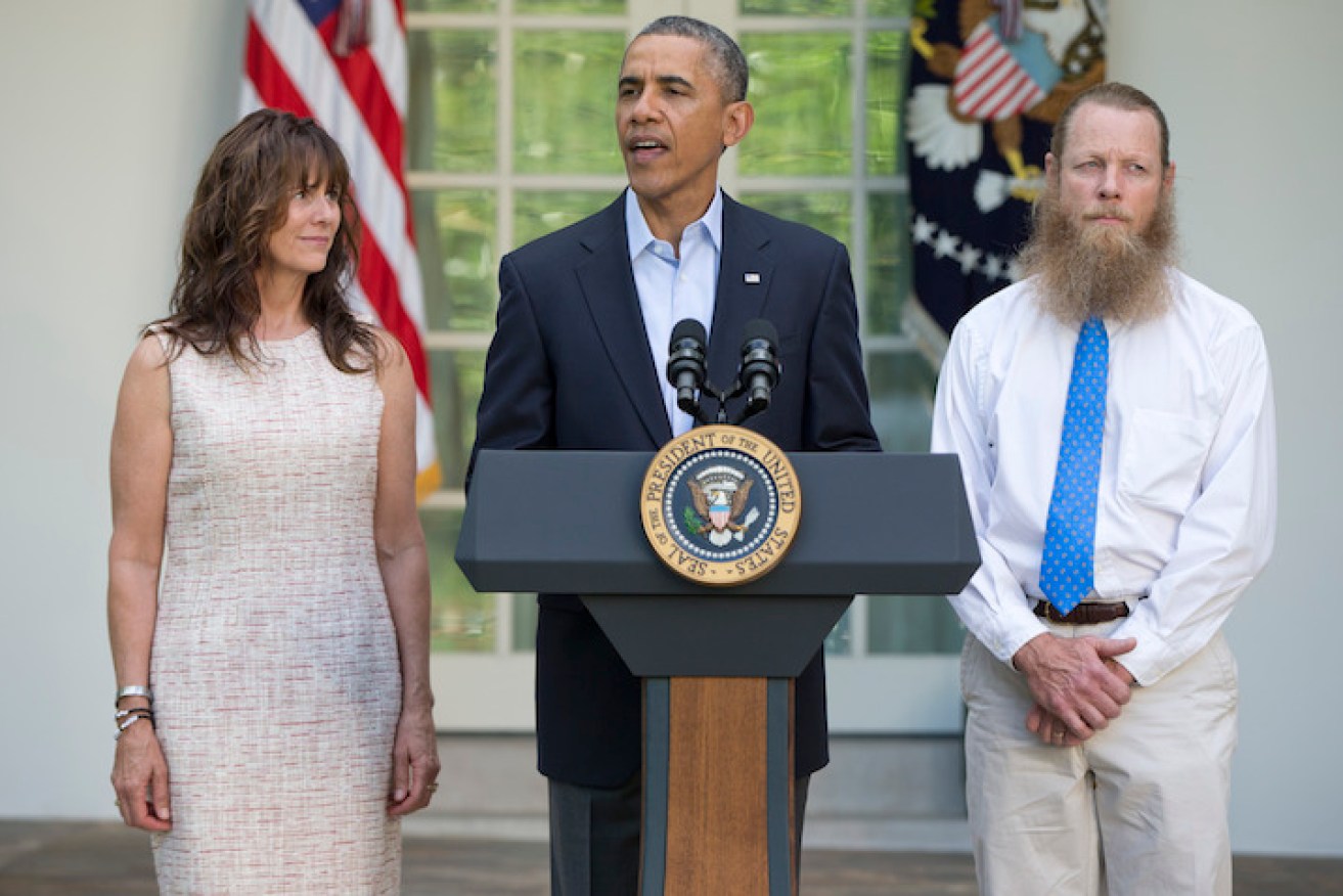 President Barack Obama (centre), Jani Bergdahl (left) and Bob Bergdahl (right) during a news conference on May 31, 2014 about the release of Sgt. Bergdahl. Photo: AAP