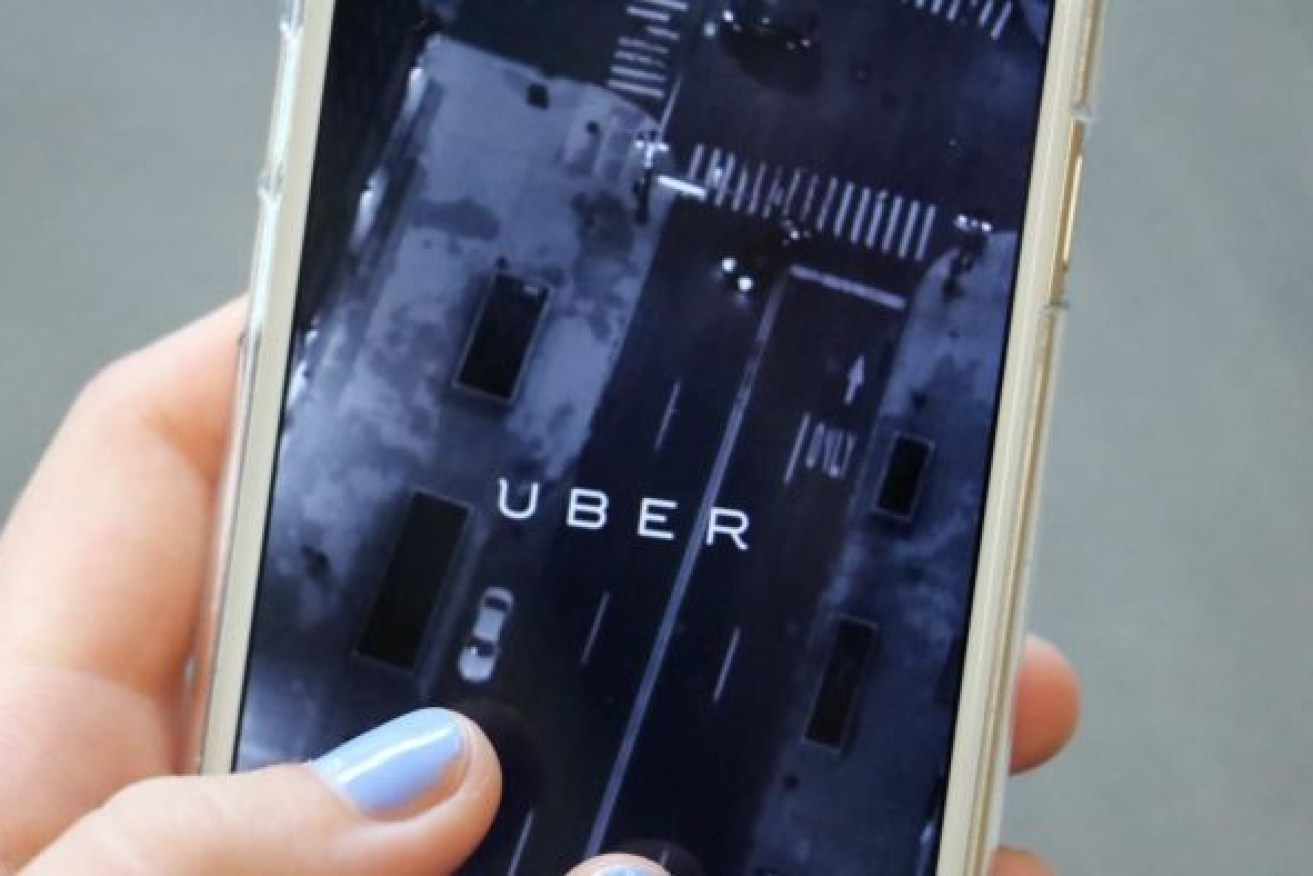 Another Uber driver has been charged over an incident allegedly involving a female passenger.