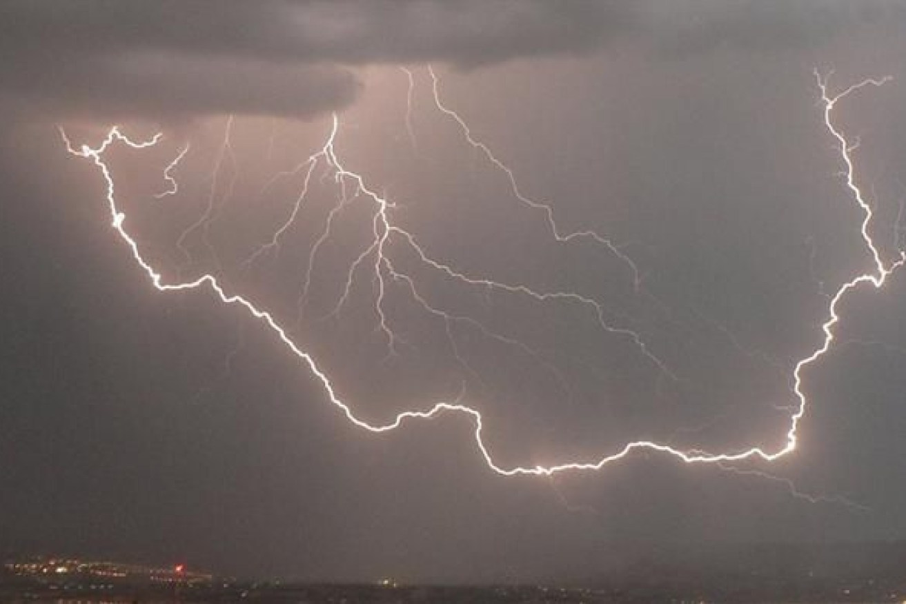 Lightning strikes in Sydney have hit two people. 