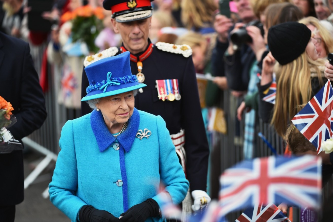 The Queen is greeted by adoring fans.