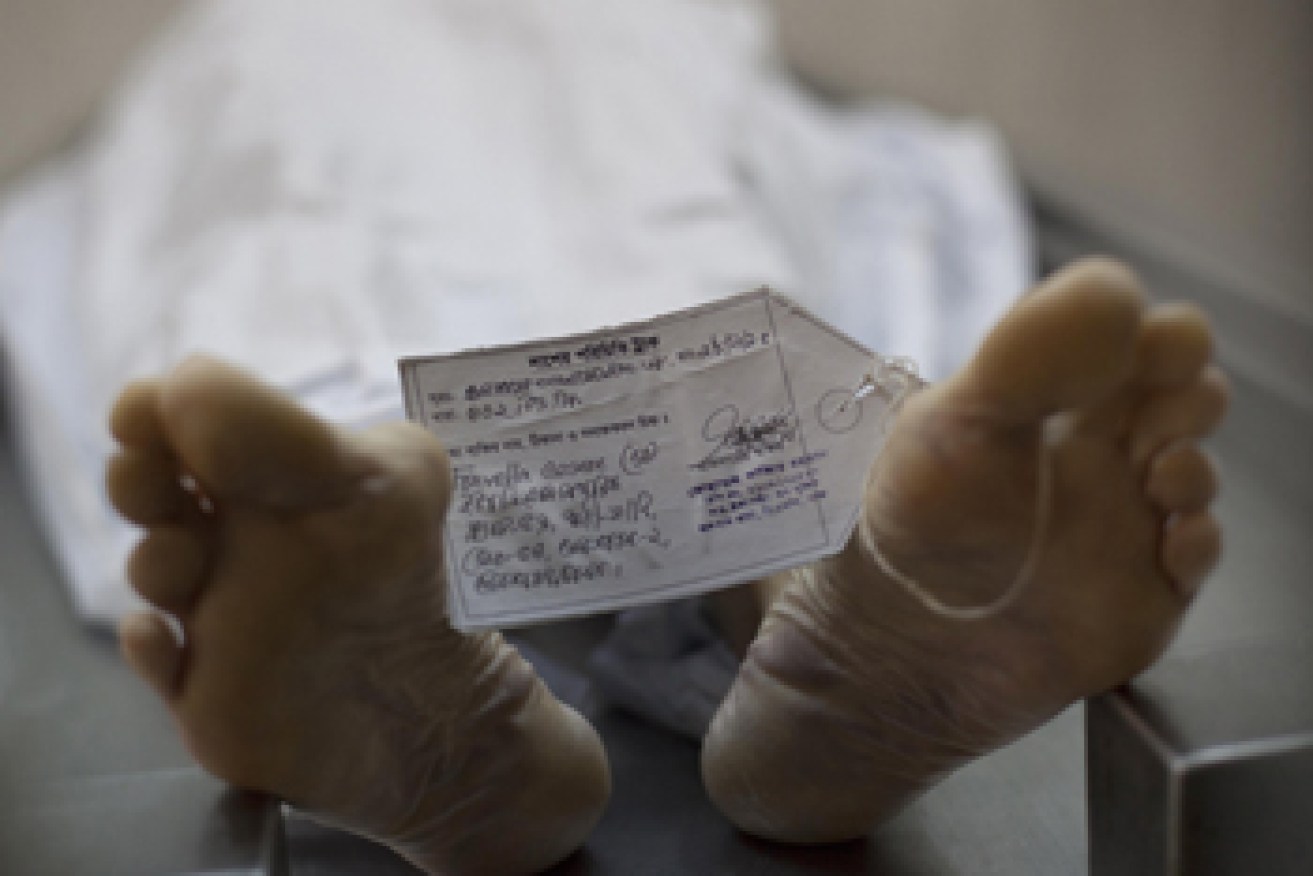Cesare Travelle's body lies in a morgue. Photo: Getty