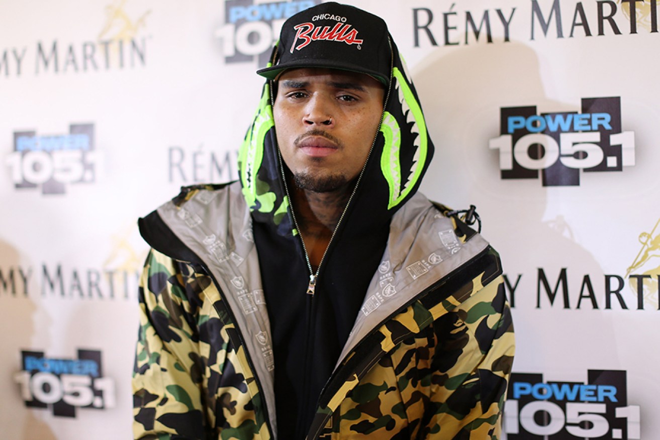 Chris Brown challenged police to come and get him.