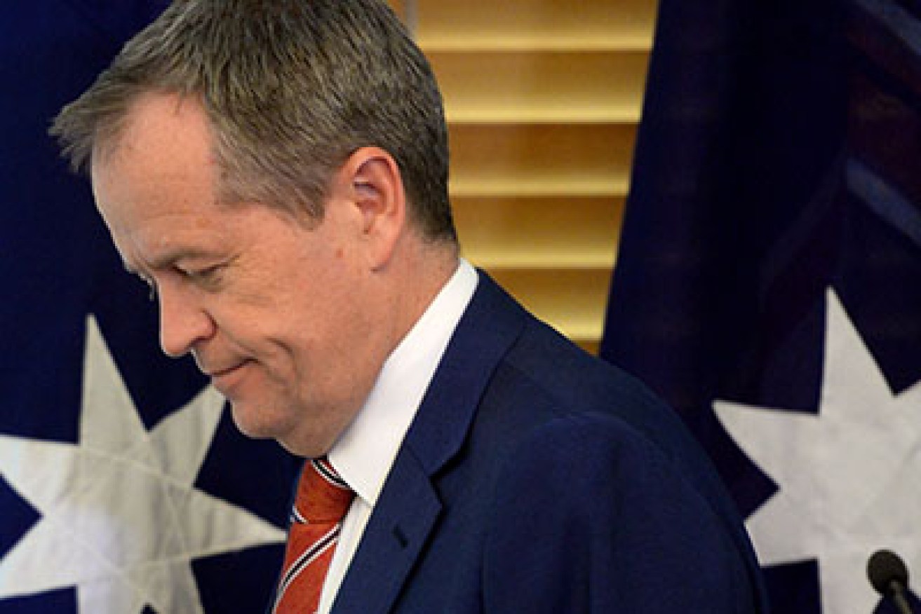 Australian Federal Opposition Leader Bill Shorten departs the stage after addressing the Federal Labor Caucus meeting inside the Federal Labor Party Room meeting at Australian Parliament House in Canberra, Tuesday, Sept. 15, 2015. Australian Prime Minister designate Malcolm Turnbull last night won the Australian Federal Leadership in a party ballot vote, at Australian Parliament House. (AAP Image/Sam Mooy) NO ARCHIVING