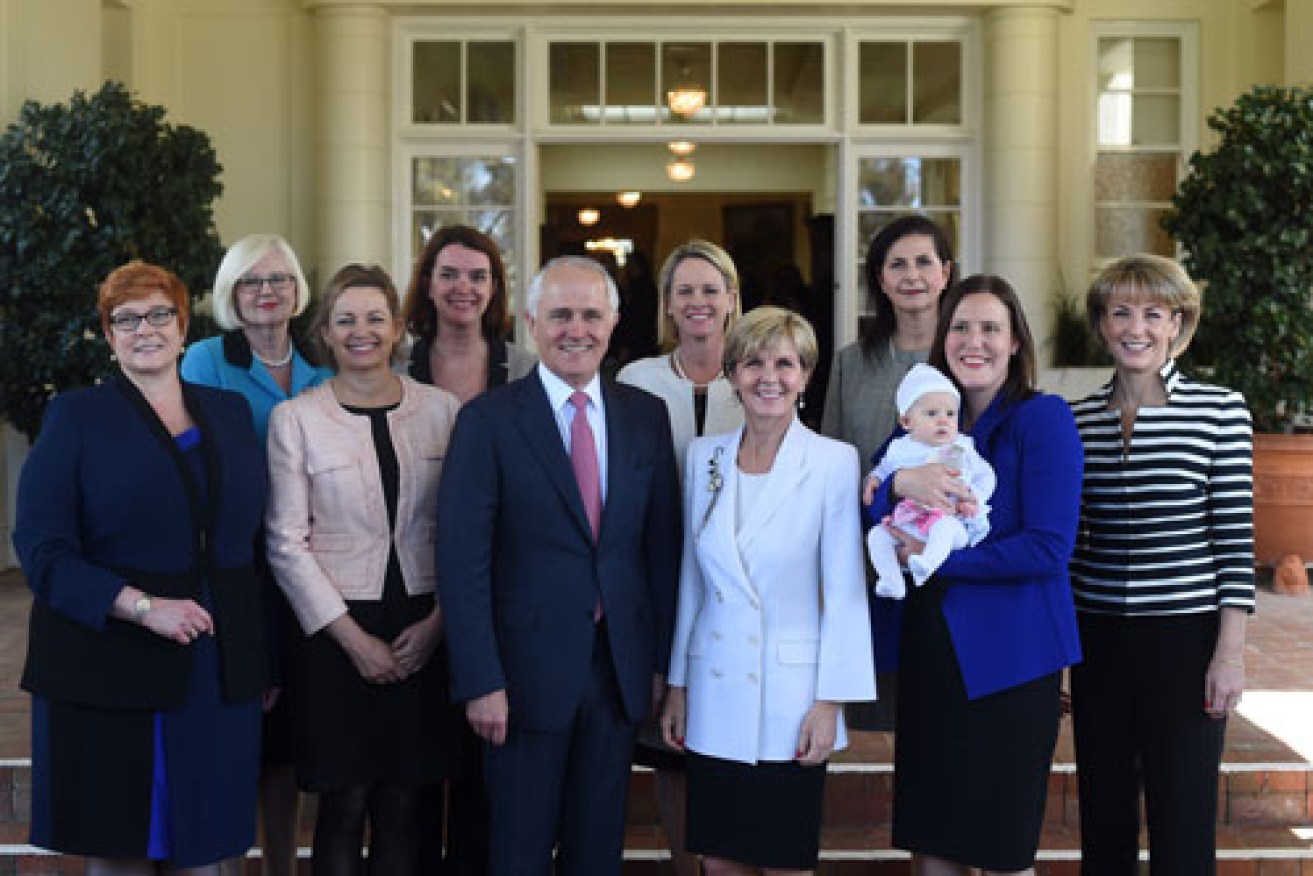 The PM poses with female members of the government. Photo: AAP