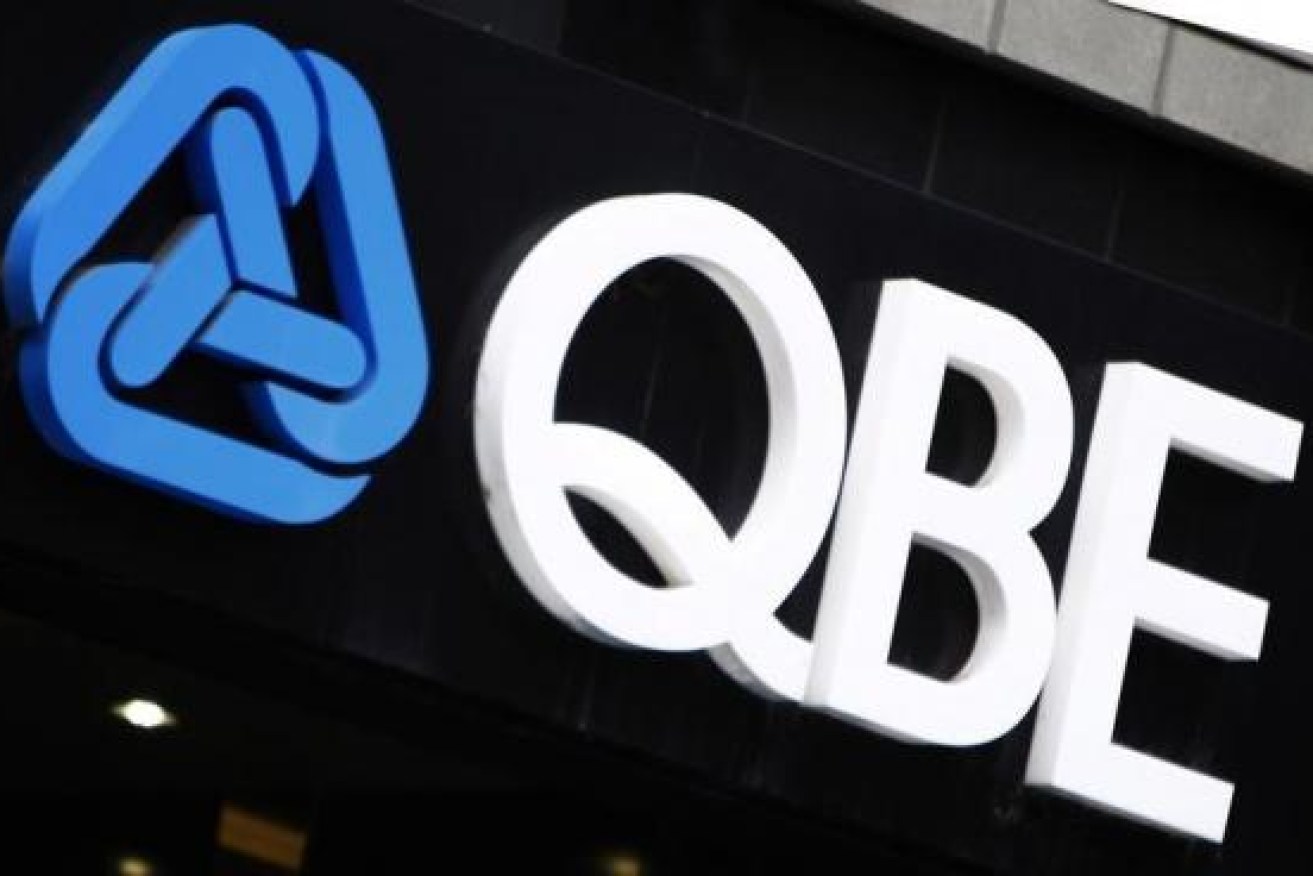 The QBE Insurance logo is seen on an office building in Melbourne February 28, 2011. REUTERS/Mick Tsikas
