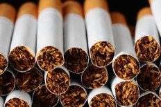 Two injured in bungled tobacco shop firebombing