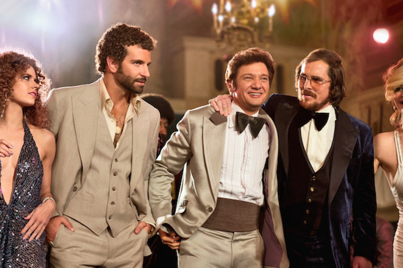 Adams (far left) and Lawrence (far right) earned less than their male co-stars for 'American Hustle'.