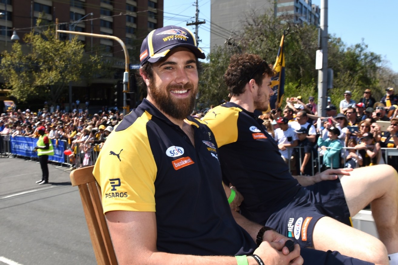 Coleman medalist  Josh Kennedy enjoys the Melbourne sunshine. Photo: AAP