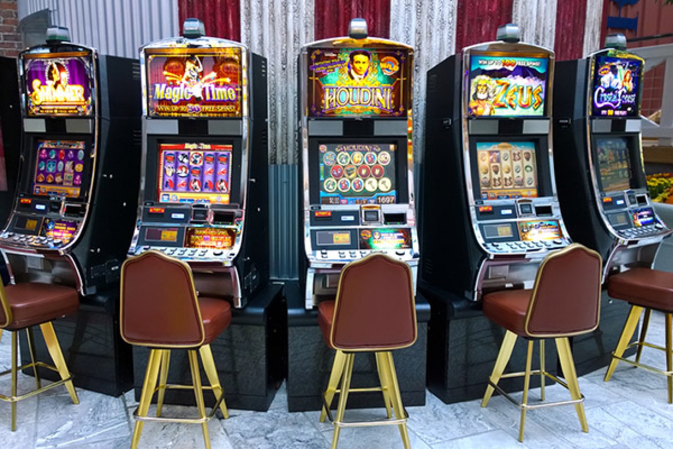 Gambling addicts received loans of up to $8000 to keep them pushing the 'play' button,, authorities say.<i>Photo: AAP</i>