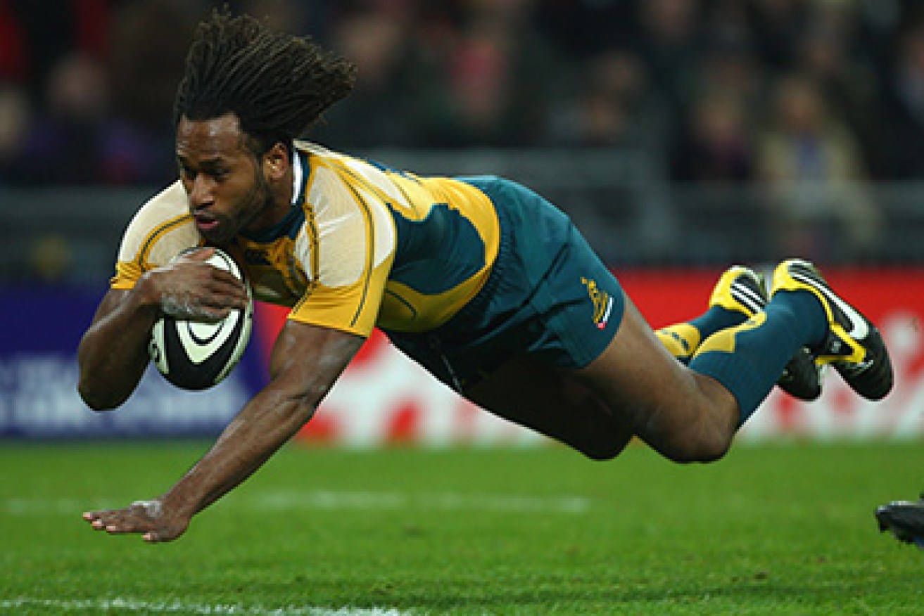 LONDON - DECEMBER 03:  Lote Tuqiri of Australia dives over for the first try of the match during the 1908 - 2008 London Olympic Centenary match between The Barbarians and Australia at Wembley Stadium on December 3, 2008 in London, England.  (Photo by Mike Hewitt/Getty Images) *** Local Caption *** Lote Tuqiri