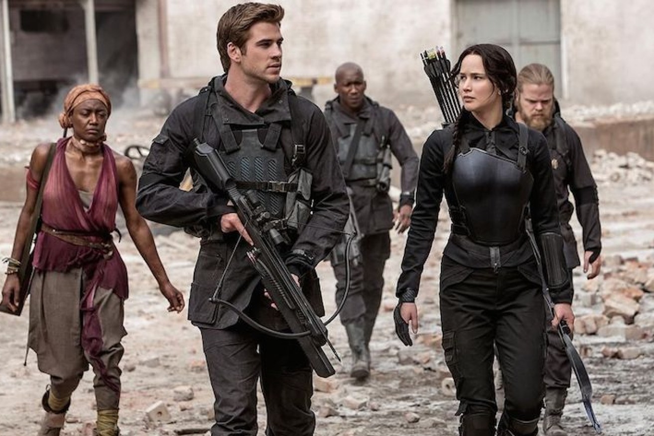 Liam Hemsworth and Jennifer Lawrence play teenagers caught in wide-scale rebellion.