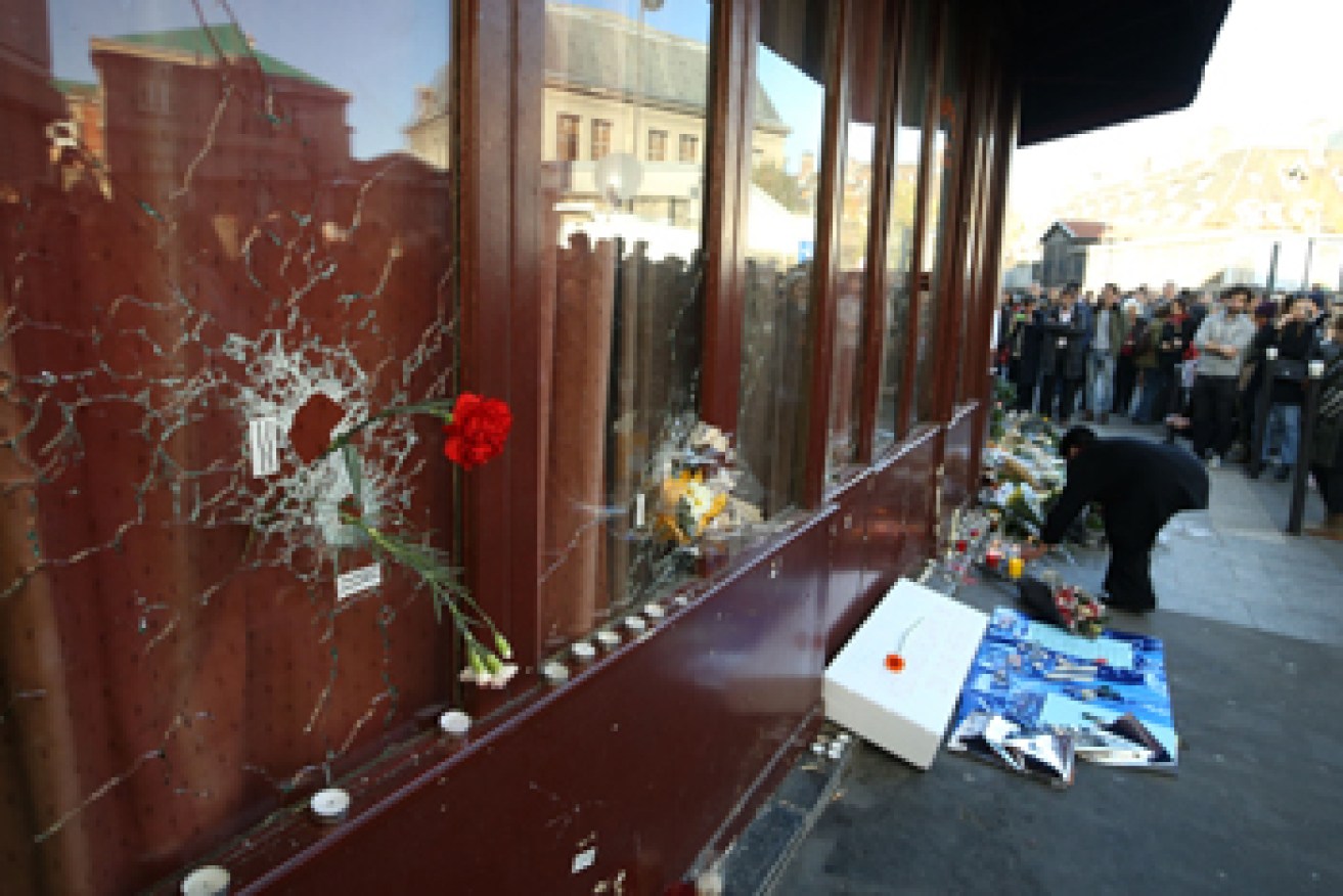 Parisians have left floral tributes to the bar's victims. Photo: Getty