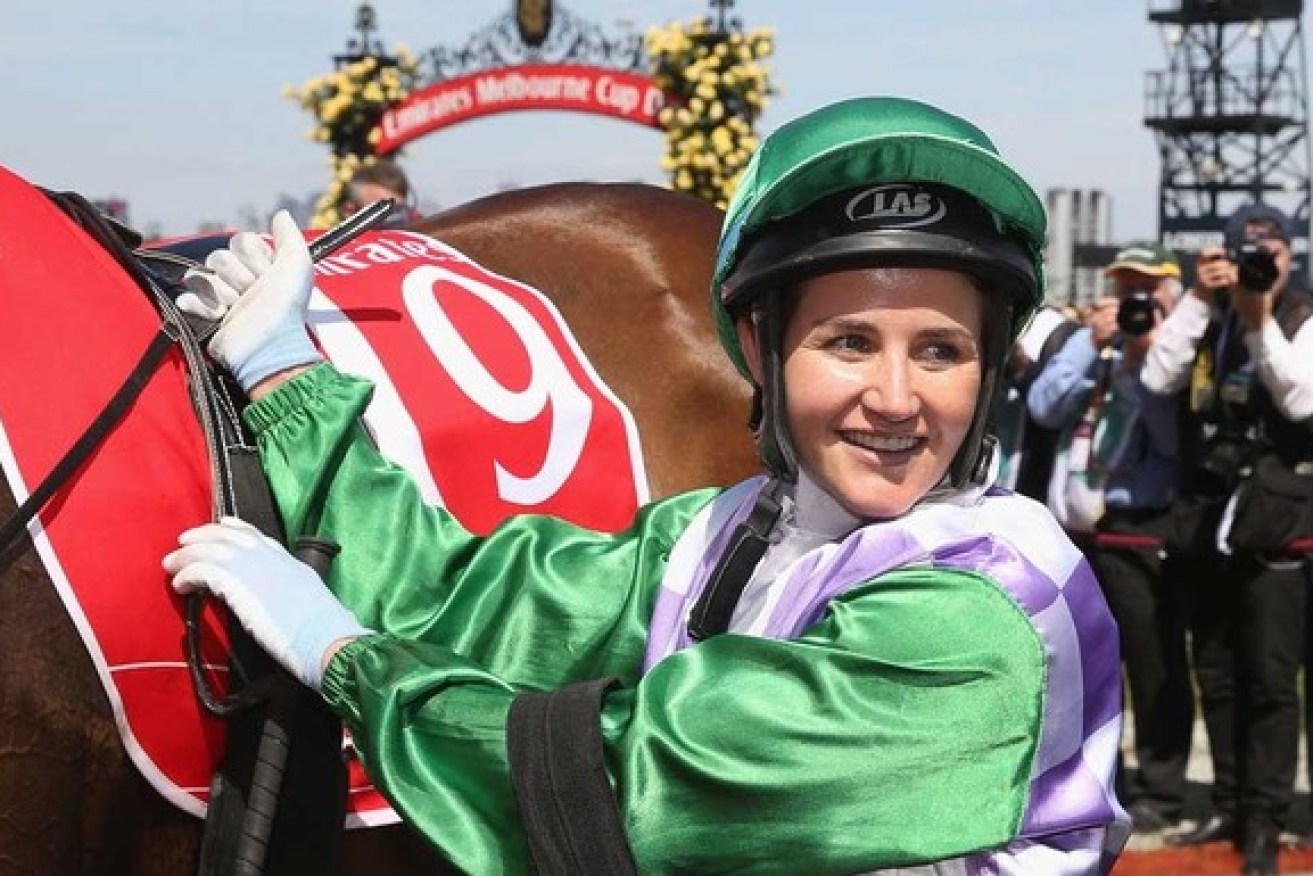 Ride like a girl: Michelle Payne after winning the Melbourne Cup on Prince of Penzance on November 3, 2015.