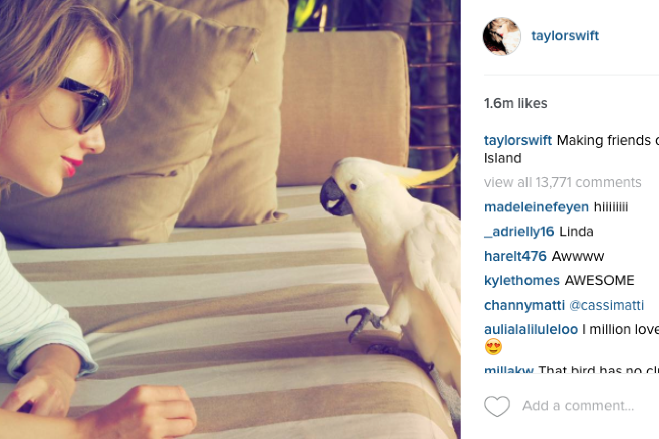 Swift is holidaying on Hamilton Island with her family and crew.