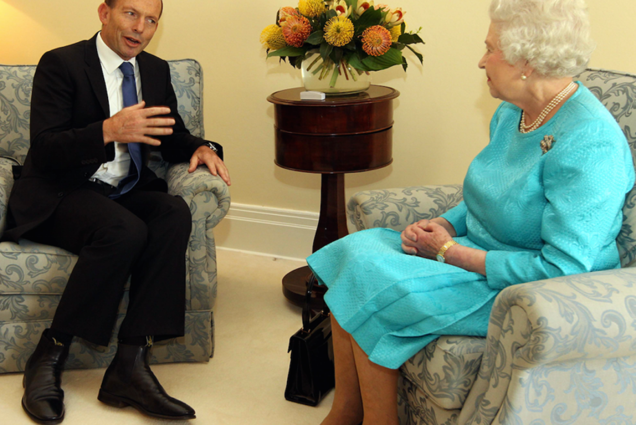 Tony Abbott at a Canberra meeting with the Queen in 2015. Mr Abbott has proved he renounced his UK citizenship.