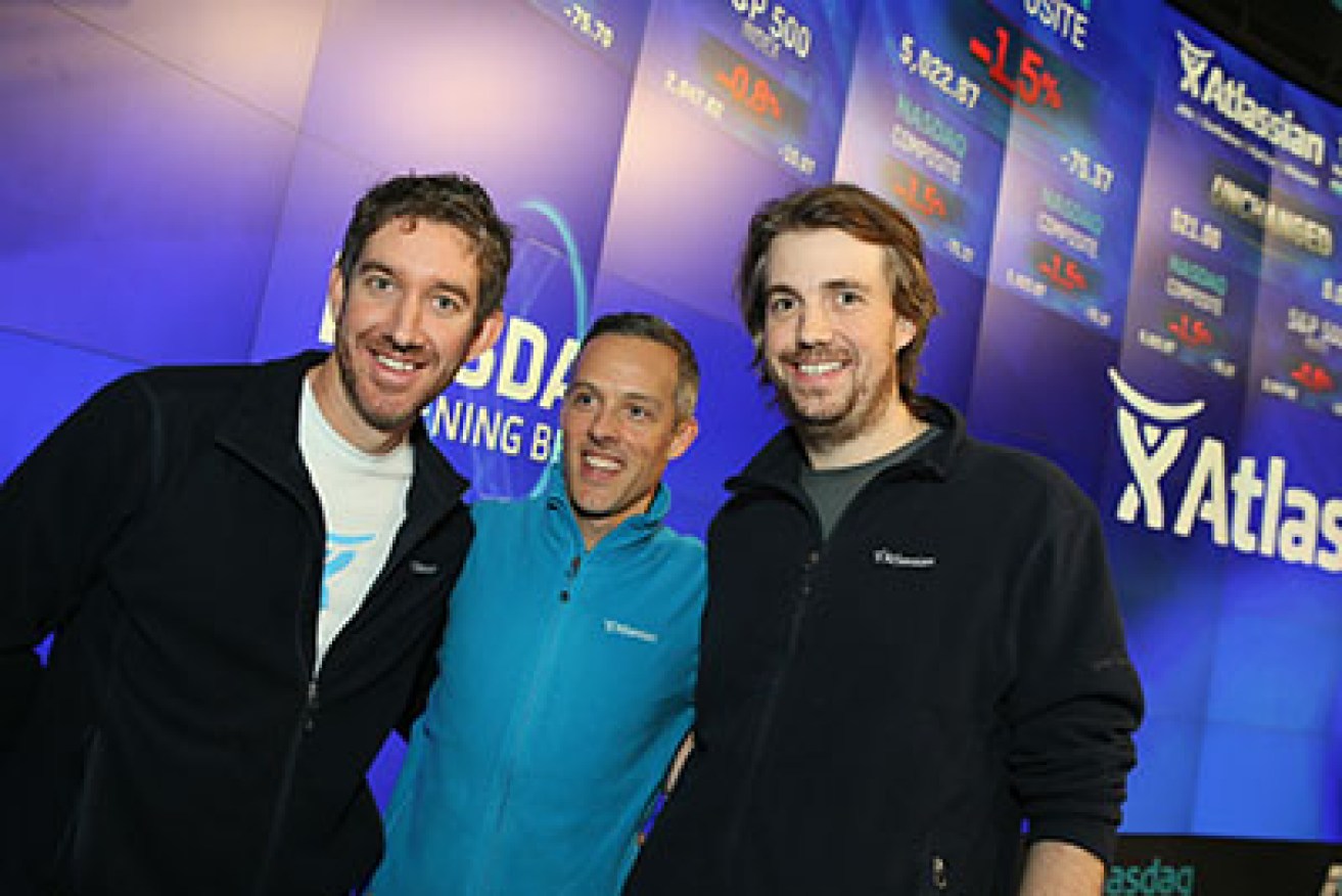 A supplied image obtained Friday, Dec.11, 2015 of the Co-Founders of Sydney technology company Atlassian Scott Farquhar (left) and Mike Cannon-Brookes (right),  during the launch of their company's stock on the US Nasdaq market. Aussie tech darling Atlassian has smashed its debut on the US Nasdaq market, with its stock soaring by 32 per cent, valuing the company at $A8 billion and making its co-founders overnight billionaires.
(AAP Image/Howorth) NO ARCHIVING, EDITORIAL USE ONLY