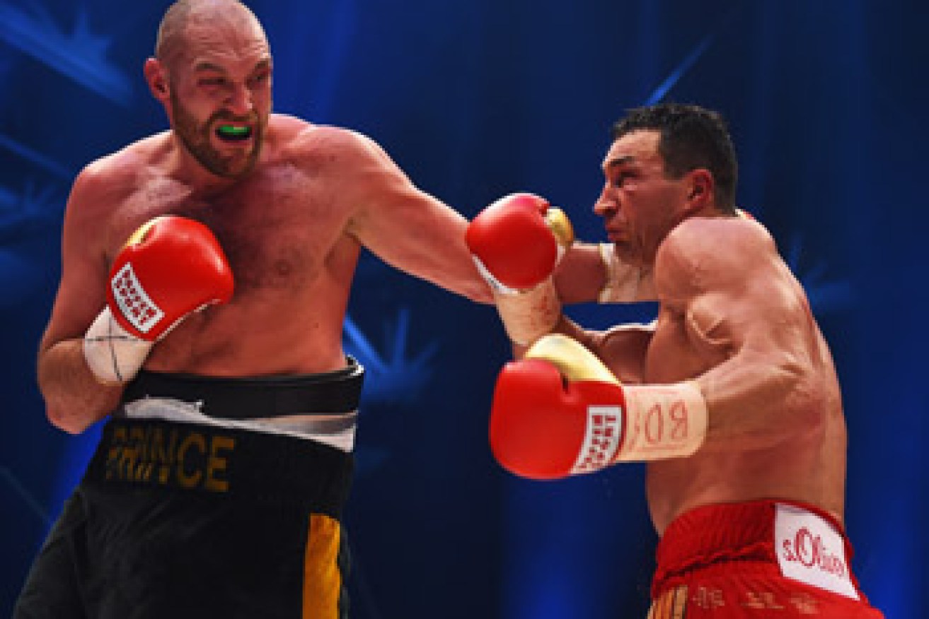 Tyson Fury in action with Wladimir Klitschko during the world championship title in November. Photo: Getty