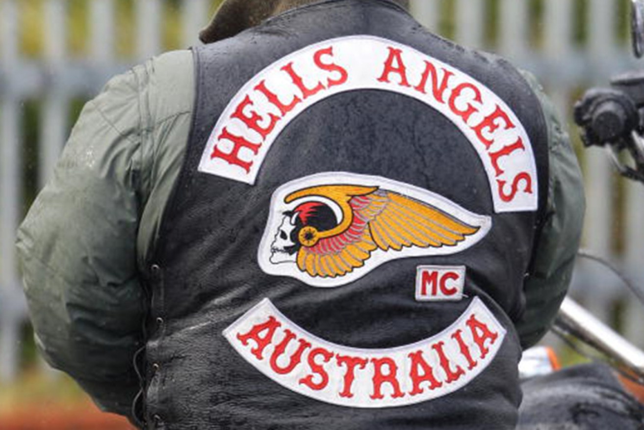 Two Hells Angels have won a High Court bid to seize back control of a rural property.