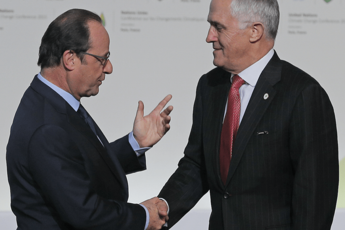 French President Francois Hollande greets Mr Turnbull at the conference. Getty