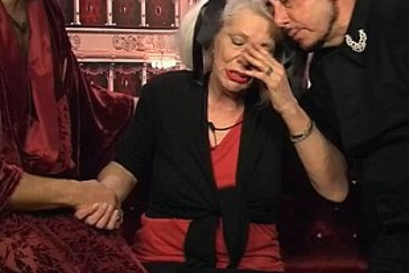 Angie is comforted on camera by fellow housemates during an episode of 'Celebrity Big Brother'.