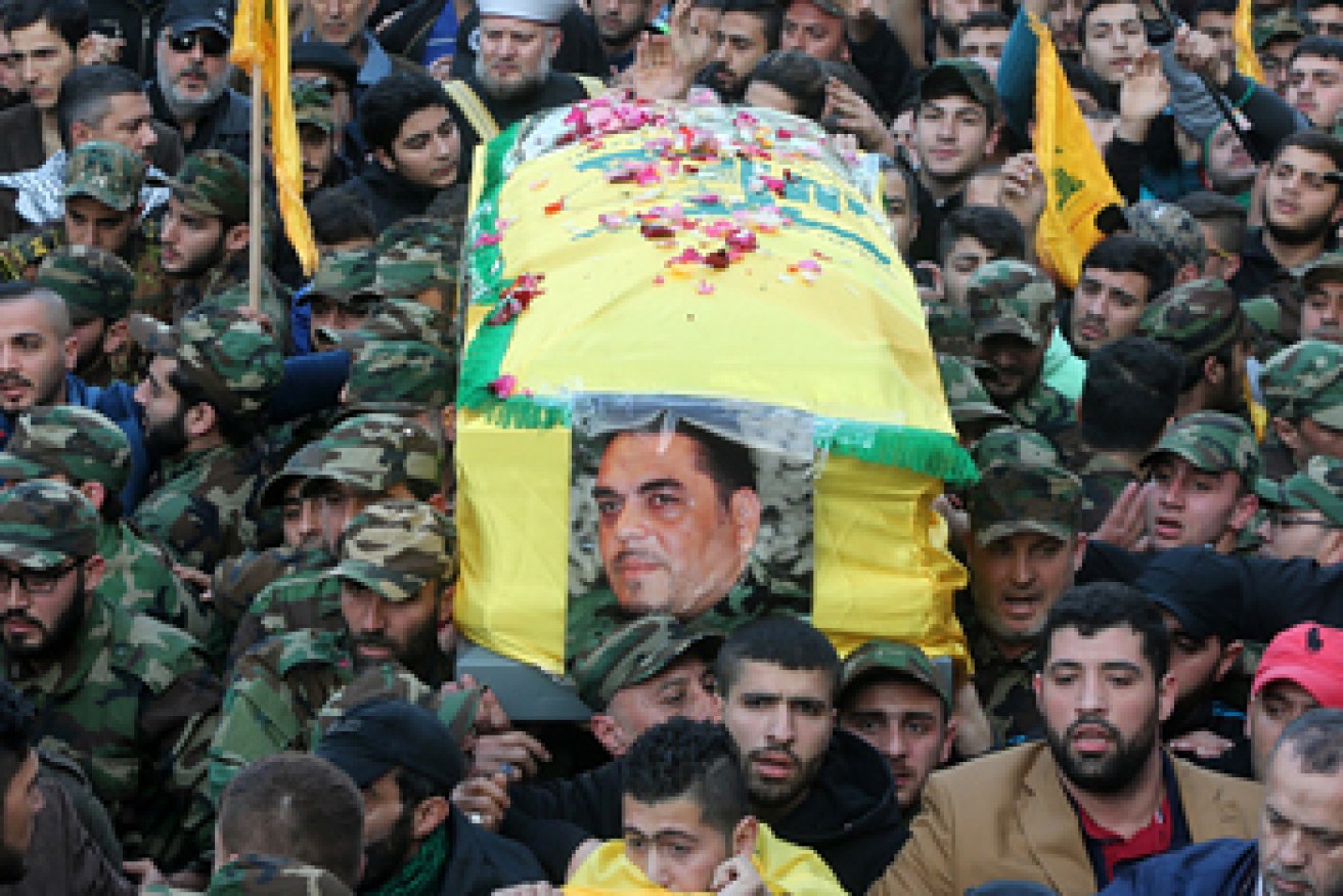 Hezbollah members carry the coffin of Samir Qantar on December 21. Photo: Getty