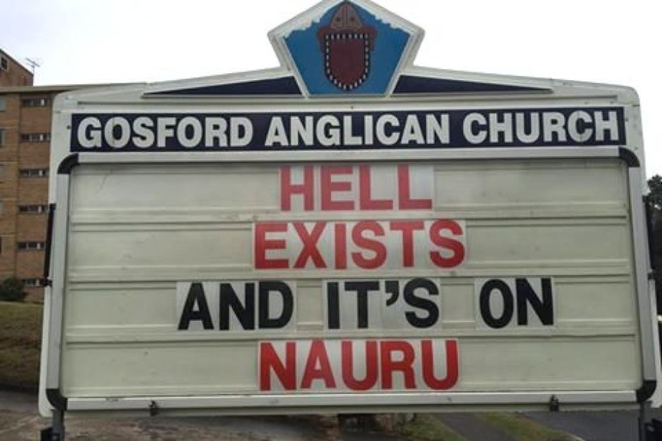 One of Rod Bower's controversial church signs at his Gosford parish. 