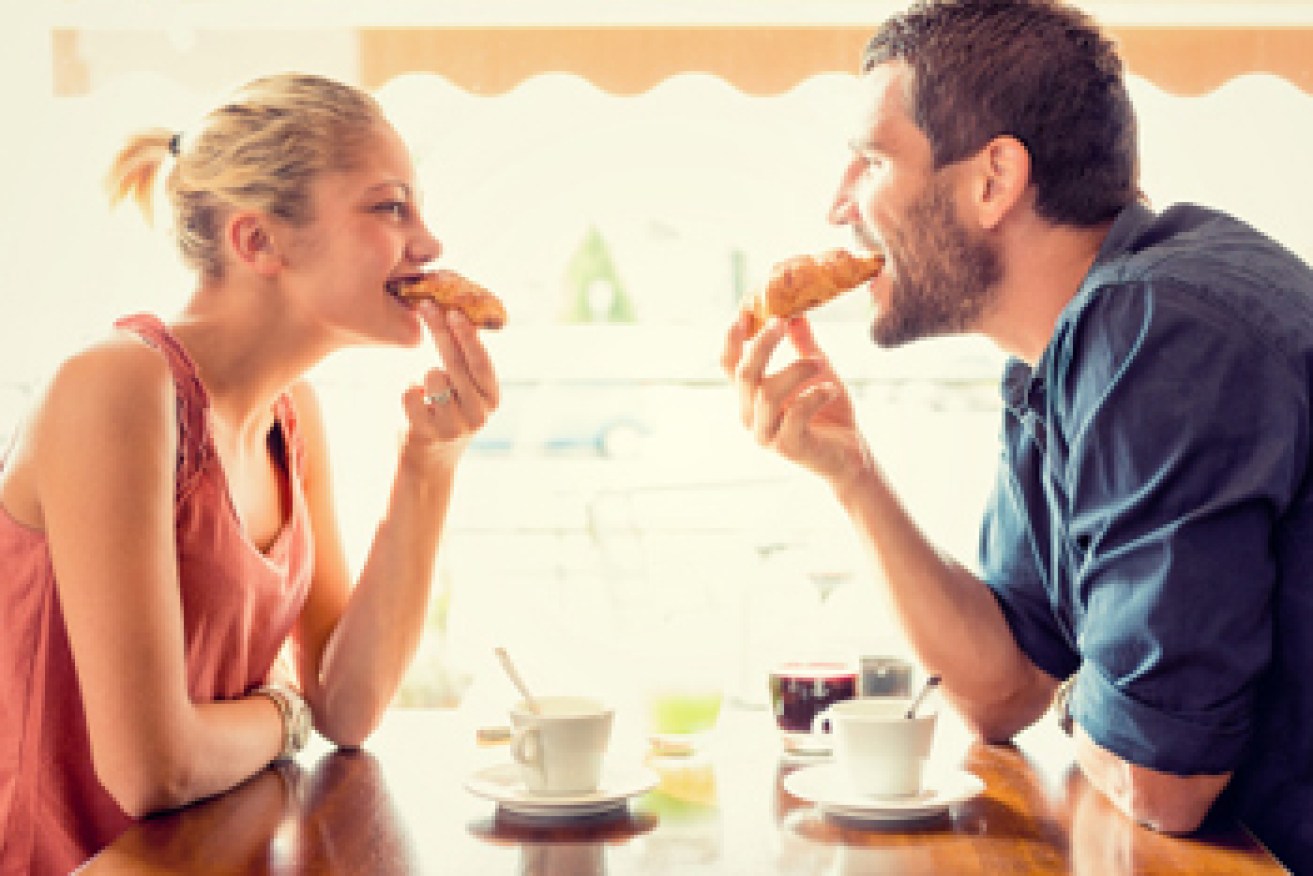 Couple eating. Photo: Getty