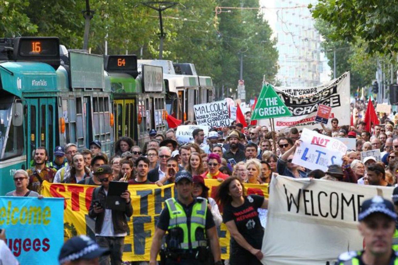 More than 2000 people attended 'Let Them Stay' protest in Melbourne. 

AAP: David Crosling