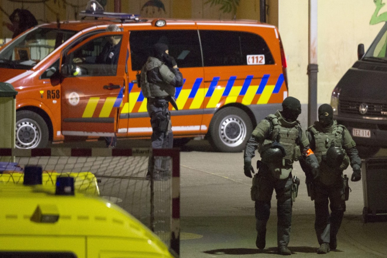 Special operations police carried out the raid in Molenbeek. Image: AP