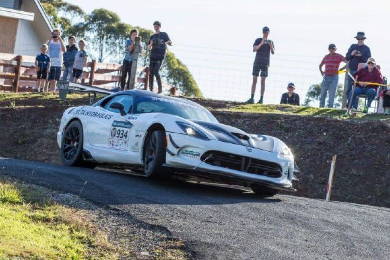 A Brisbane man has died after crashing his car in the annual Targa Tasmania rally.