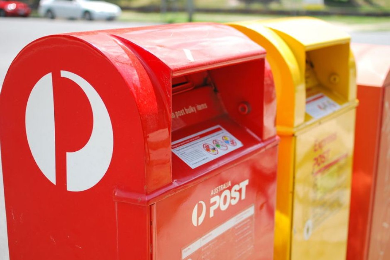 Australia Post employees are 'disgusted' work continued around a dead body.