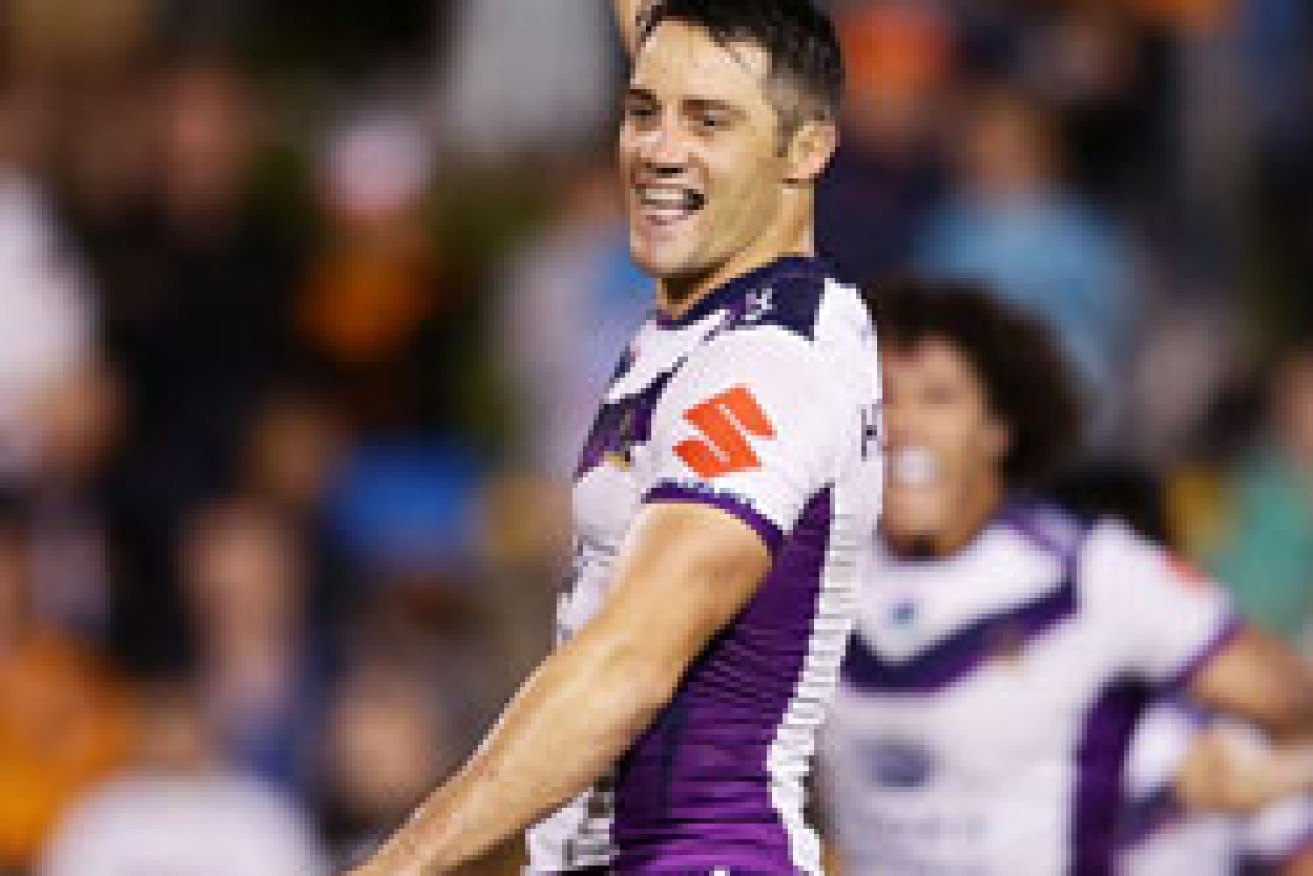 Cooper Cronk celebrates a golden point winner for the Melbourne Storm last week. Photo: Getty