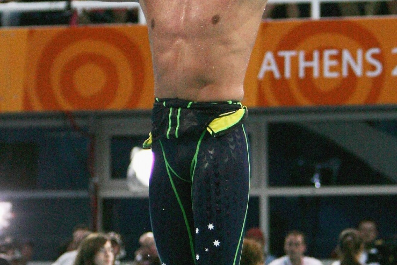 Hackett celebrates after winning gold in the 1500m freestyle at the Athens 2004 Olympics. Photo: Getty