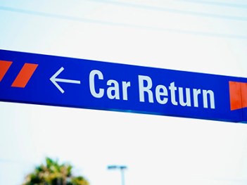 Low angle view of a rental car sign, San Diego, California, USA