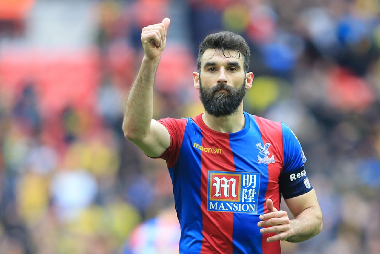 Crystal Palace's Mile Jedinak will gead to a Socceroos training camp.  PA Images.