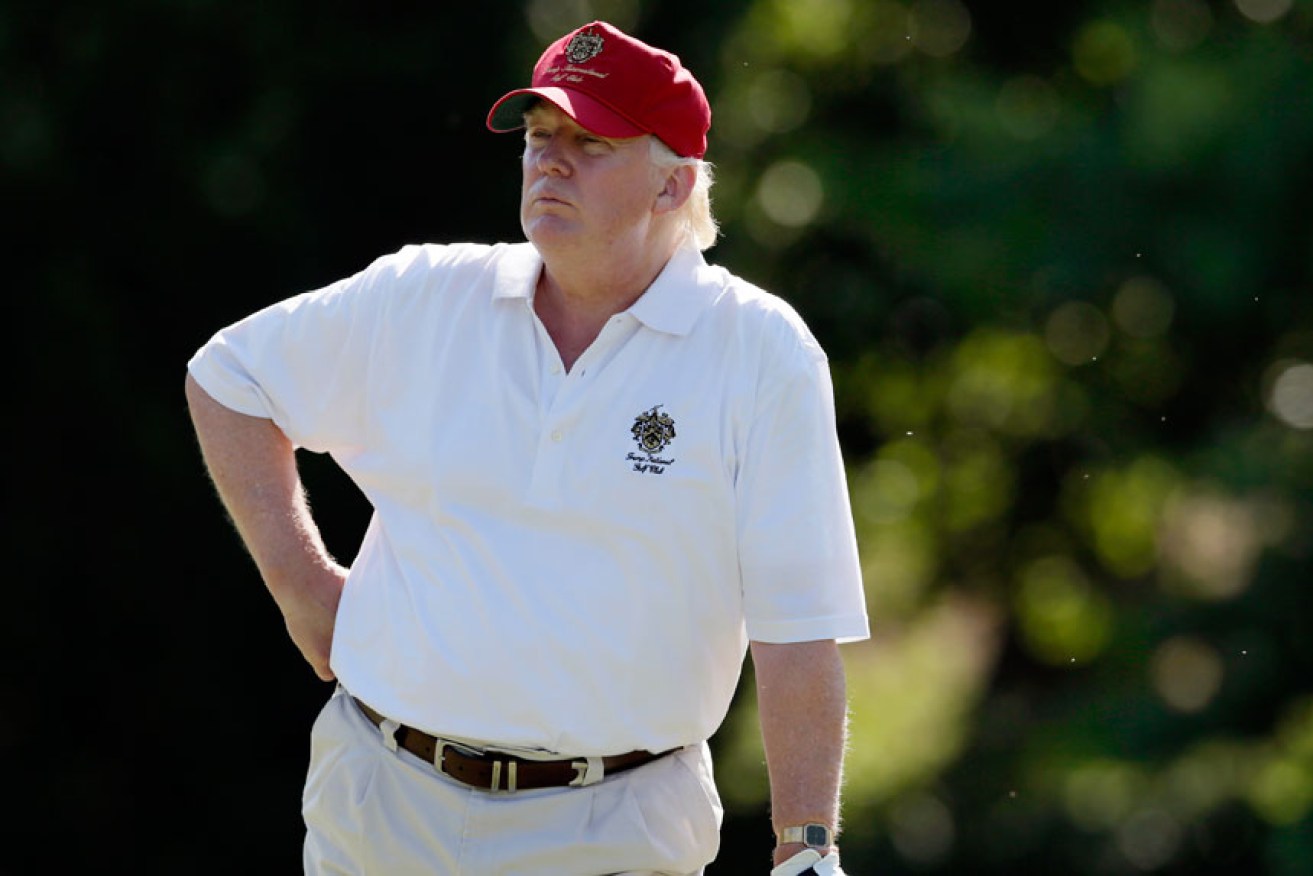 Donald Trump was swinging at golf balls and Joe Biden when the long-awaited announcement came.