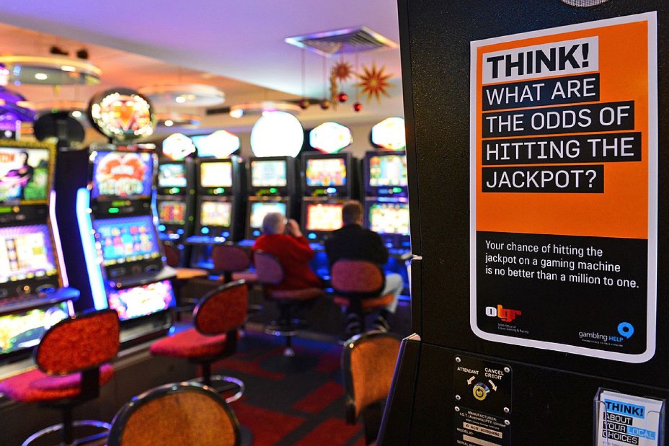Billions of dirty dollars are flushed through NSW pokie machines every year, writes Michael Pascoe.