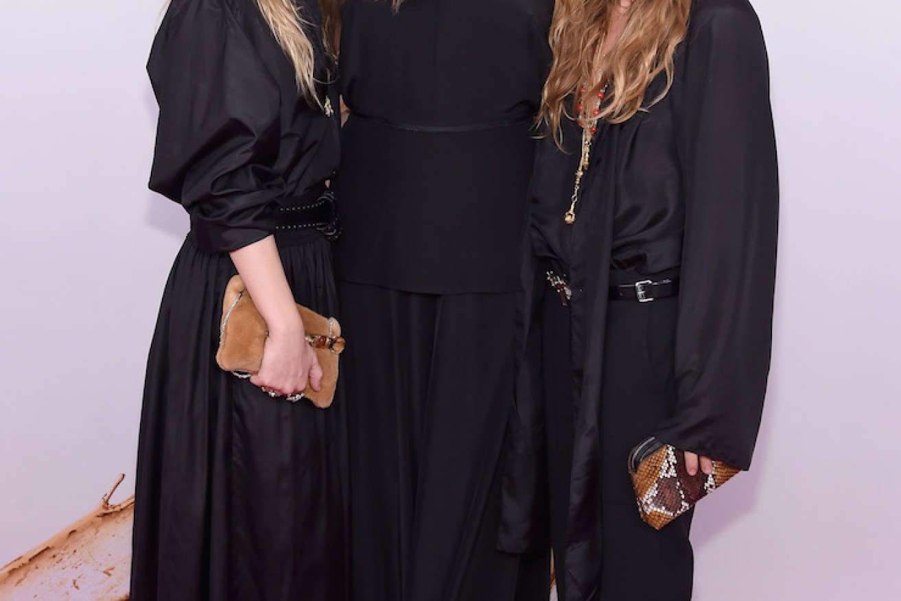 NEW YORK, NY - JUNE 06:  Elizabeth Olsen (center) and Mary-Kate and Ashley attend Olsen  the 2016 CFDA Fashion Awards at the Hammerstein Ballroom on June 6, 2016 in New York City.  (Photo by Jamie McCarthy/Getty Images)