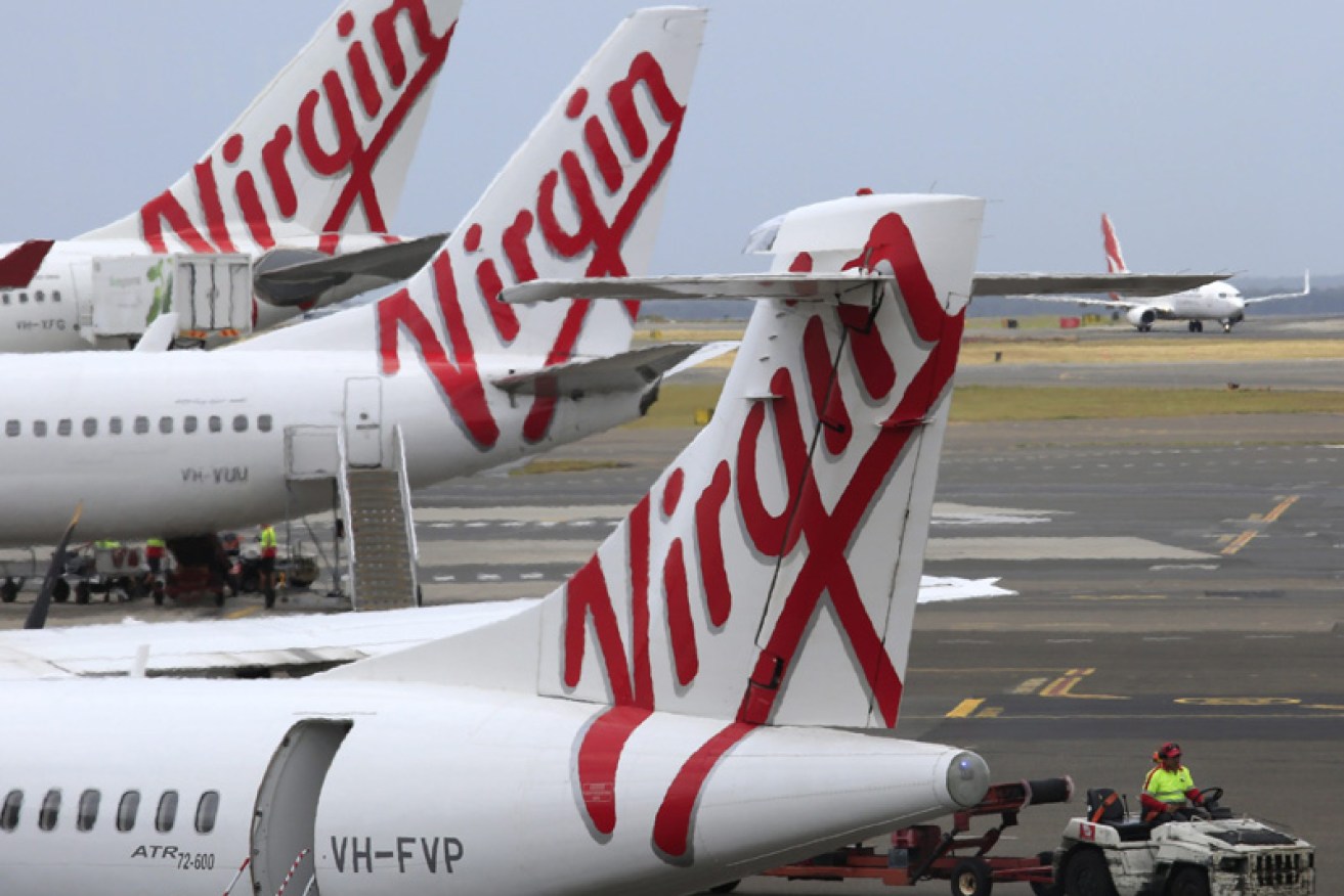 Queensland says it's serious about its bid for Virgin – but Home Affairs Minister Peter Dutton is scathing.