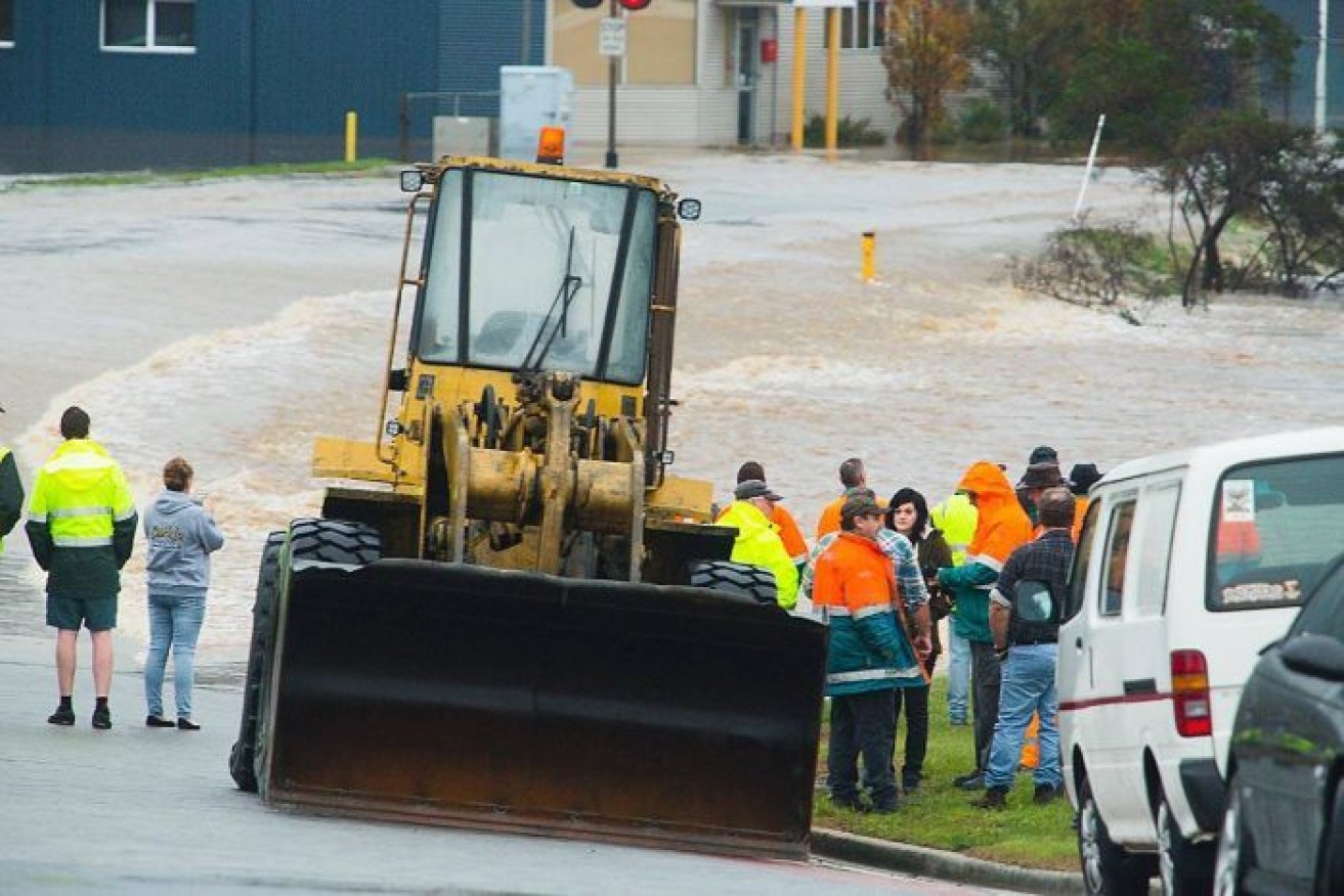 River Road, in Burnie, Tasmania, has been inundated as Emu River rises. Photo: ABC
