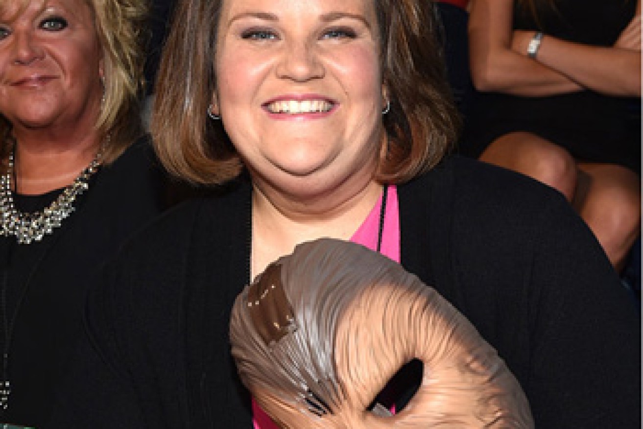Payne attends the CMT music awards – with her mask. Photo: AAP
